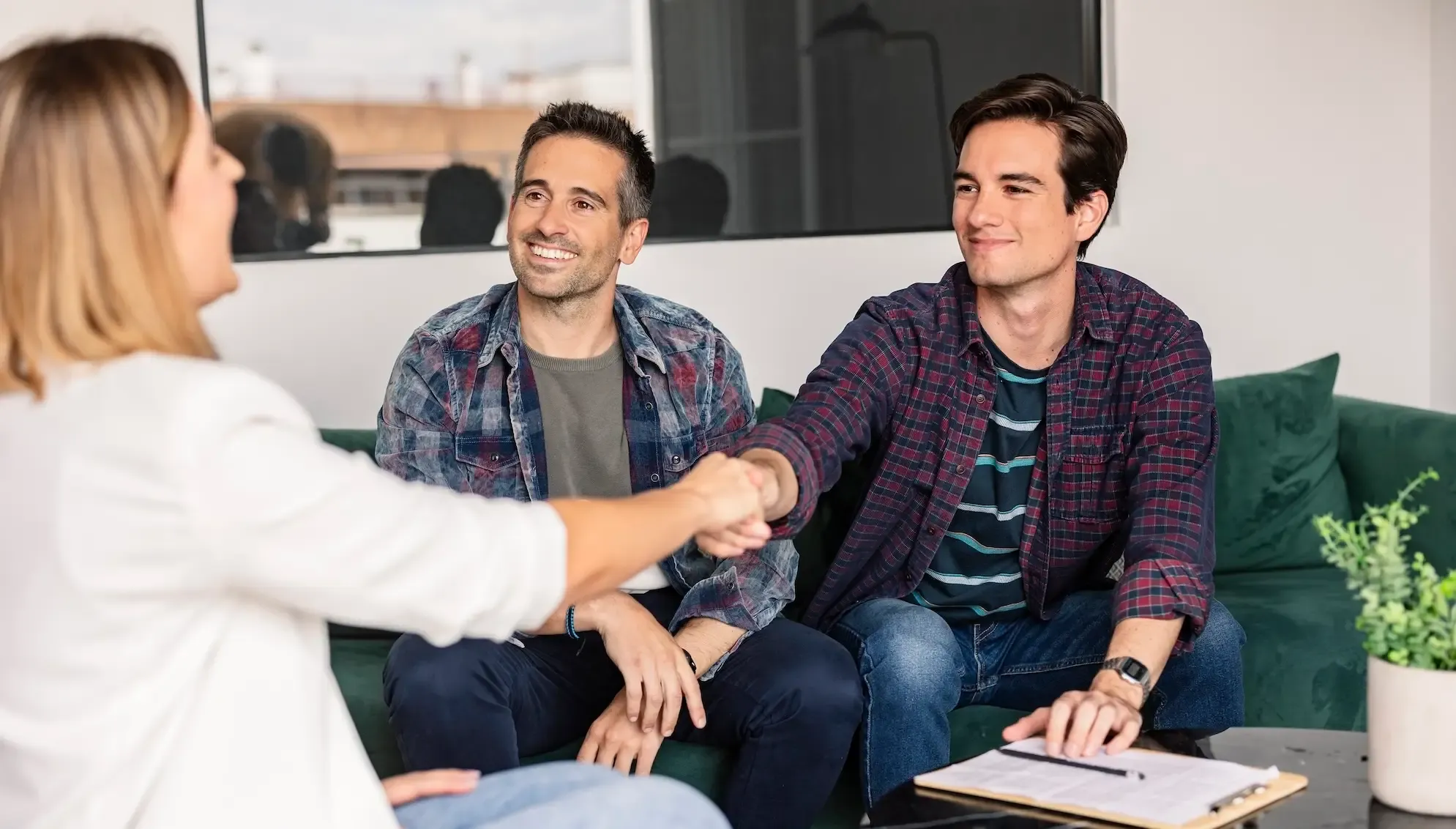 Expat reviewing a French lease contract in a Parisian apartment