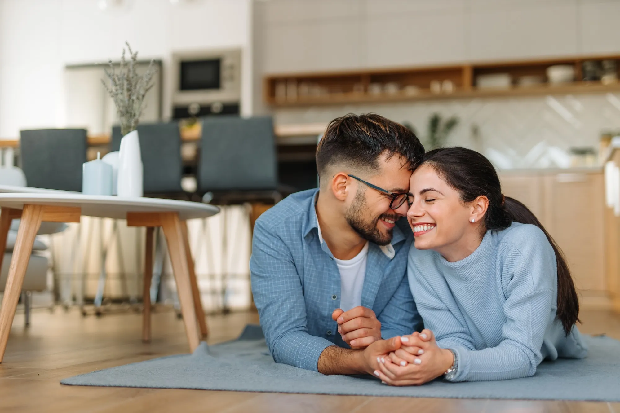 Couple settling into their new apartment in Paris